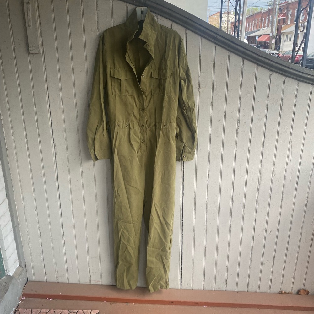 Army green utility jumpsuit.